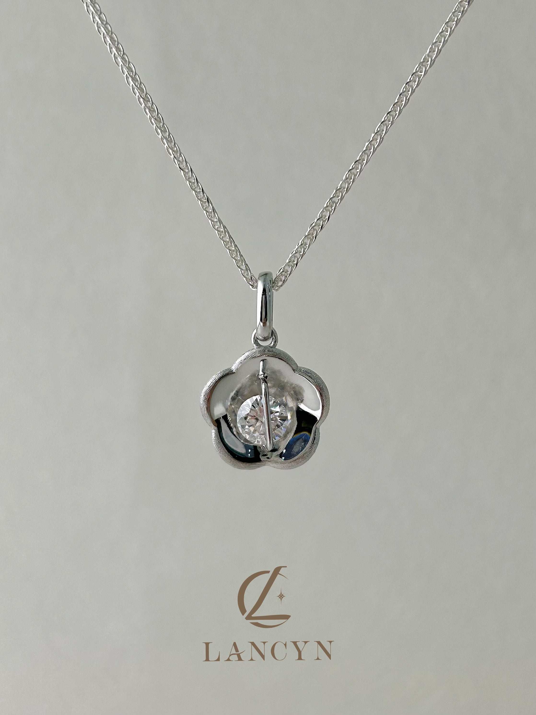 The Art of Understated Luxury: Our brushed braided bracelet with Movable, Secure Gemstones