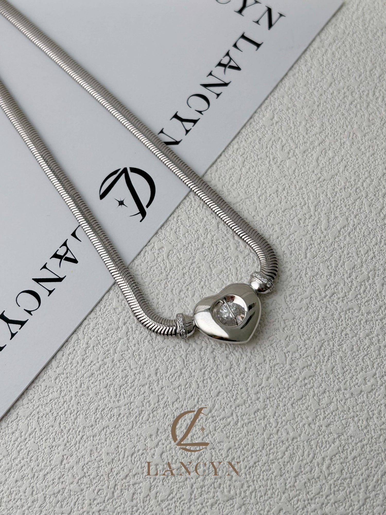 Argent Heart Orb Dancing Crystal Necklace